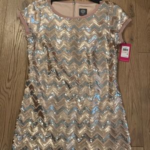 Women’s holiday sequence dress never been worn size 10.